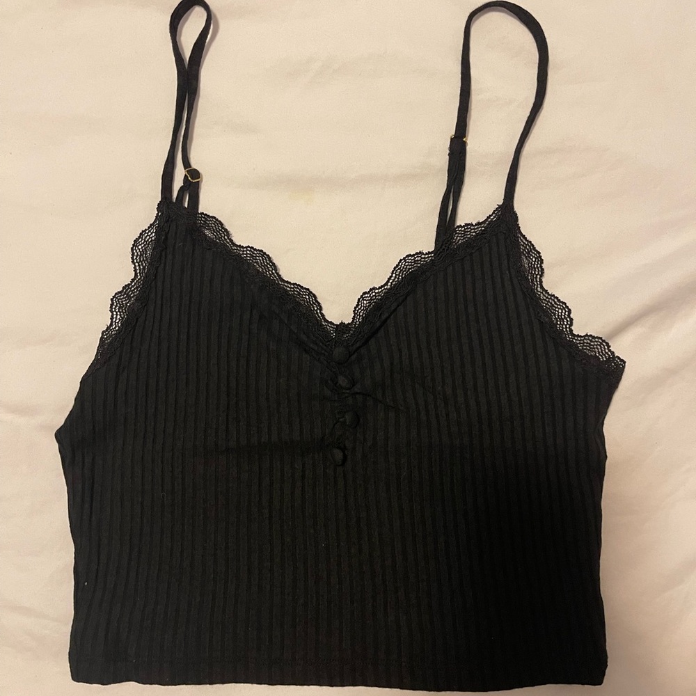 Rouje cropped black tank top with adjustable straps and buttons